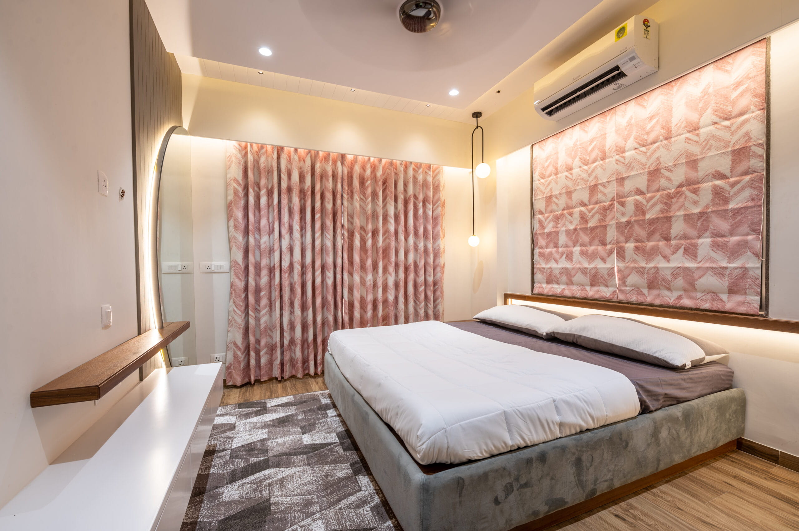 modern-bedroom-with-circular-mirror