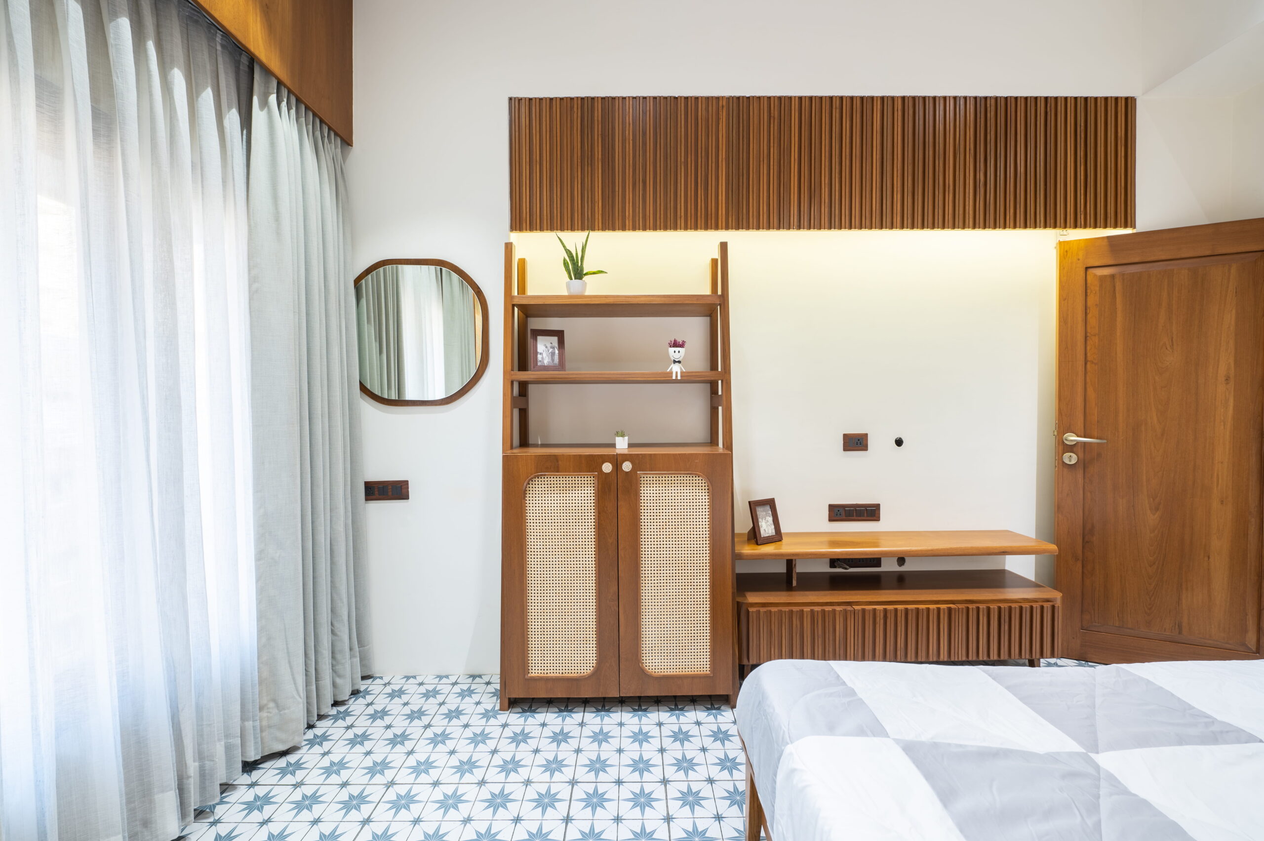 boho-bedroom-storage-with-cane-shutter-details.jpg