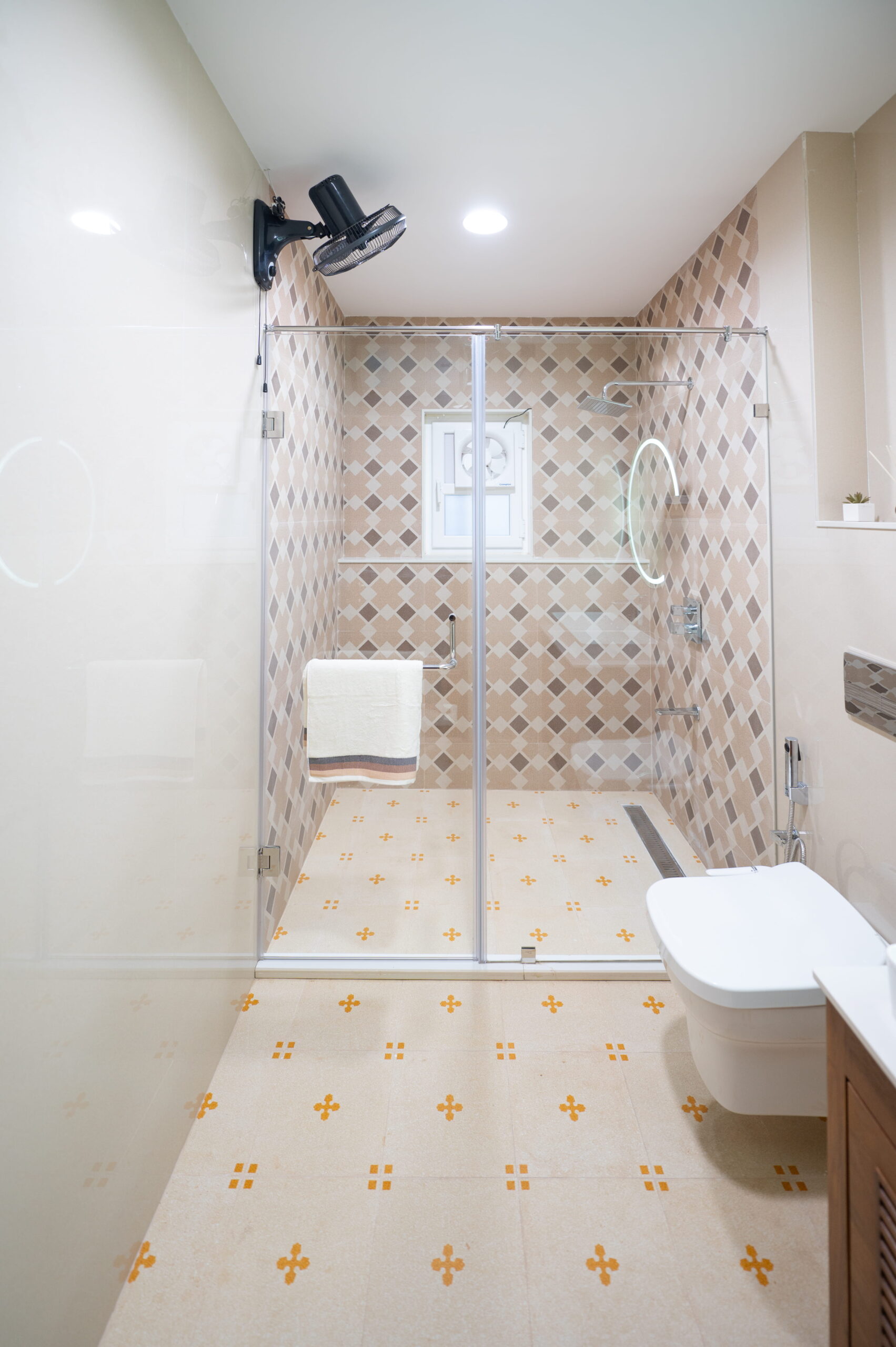 shower-area-with-geometric-tiles-and-glass-partition.jpg